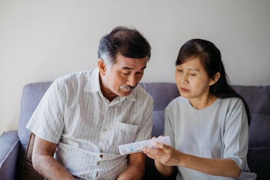 Couple looking at the daily medication